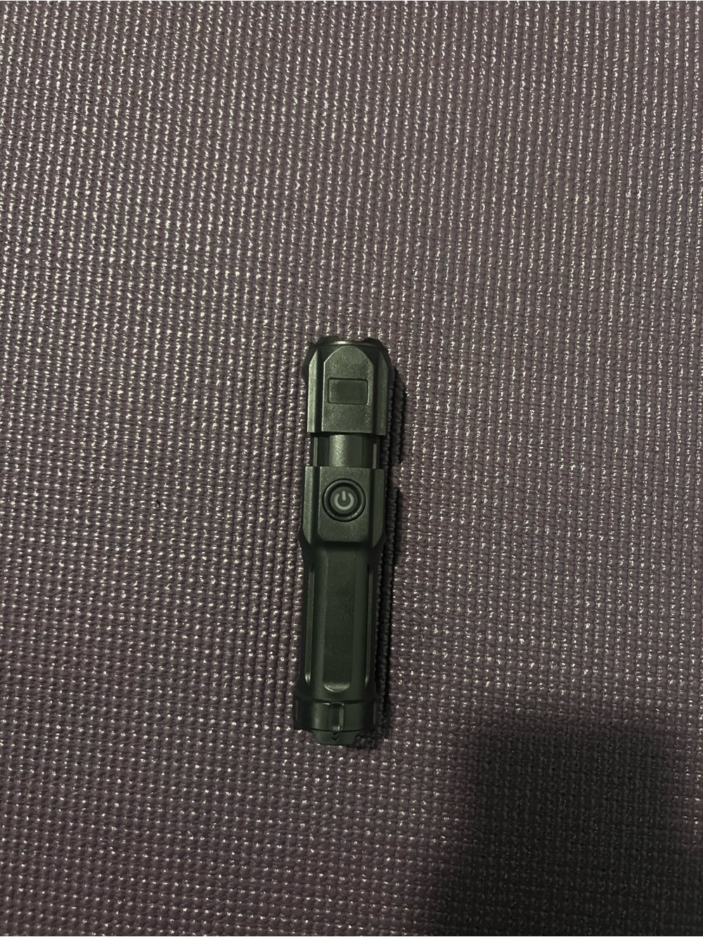 Compact Black LED Flashlight with Single-Button Control - Picture 3 of 5